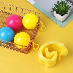 TravelTime® - Regenjas - Draagbaar - Wegwerp - Herbruikbaar - 3 Kleurrijke Ballen - Lichtblauw, Roze, Geel -Stroller shop 550x550 252